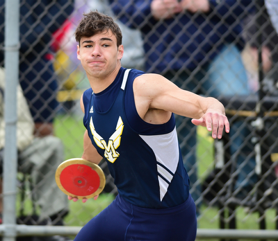 POLAND, OHIO - APRIl 25, 2015: Christian Smith of McDonald throws the discus Saturday afternoon at Poland High School during the  Poland Invitational Track & Field Meet. (Photo by David Dermer/Youngstown Vindicator)