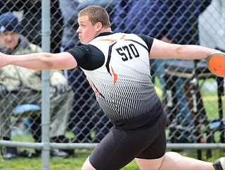 POLAND, OHIO - APRIl 25, 2015: Bucyrus Palo of Newton Falls throws the discus Saturday afternoon at Poland High School during the  Poland Invitational Track & Field Meet. (Photo by David Dermer/Youngstown Vindicator)