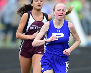 POLAND, OHIO - APRIl 25, 2015: Emily Ethridge of Poland jogs ahead of Nadine Gabriel Boardman during the girls 1600 meter run Saturday afternoon at Poland High School during the  Poland Invitational Track & Field Meet. (Photo by David Dermer/Youngstown Vindicator)