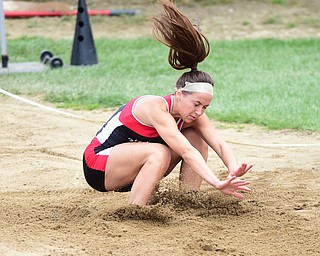 POLAND, OHIO - APRIl 25, 2015: Candace Smith plants into the sand during the Girls long Jump Saturday afternoon at Poland High School during the Poland Invitational Track & Field Meet. (Photo by David Dermer/Youngstown Vindicator)