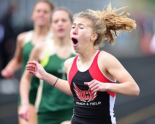 POLAND, OHIO - APRIl 25, 2015: Raquel Markulin of Canfield reacts after crossing the finish line and finishing in 2nd place during the Girls 400 Meter Dash Finals Saturday afternoon at Poland High School during the Poland Invitational Track & Field Meet. (Photo by David Dermer/Youngstown Vindicator)