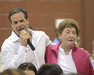 Katie Rickman | The Vindicator.Anthony Horvath sings a song in Italian as his aunt Anita Marsco of Struthers joins in during a benefit for Robert J. Melone at St. Charles Hall in Boardman on April 26, 2015.