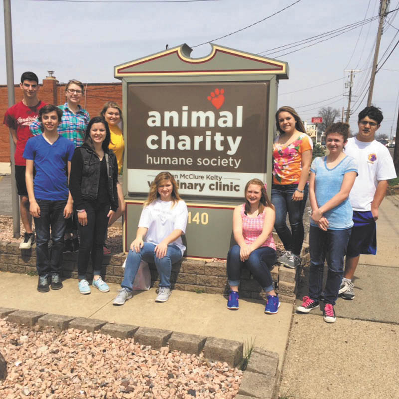 SPECIAL TO THE VINDICATOR
Members of Holy Family Youth Ministry of Poland volunteered their time and talents at Animal Charity Humane Society on April 19. Among their tasks were bathing, walking and playing with animals and cleaning floors and cages. After a job well done, the group stopped for ice cream at Handel’s. From left in the first row are Michael Puhalla, Lauren Pepperney, Abbey Lea, Tori Moderalli and Maria LoCicero. In the second row are Jared Argiro, Meredith Lea, Alena Argiro, Angelina Sabatino and James Maruca.