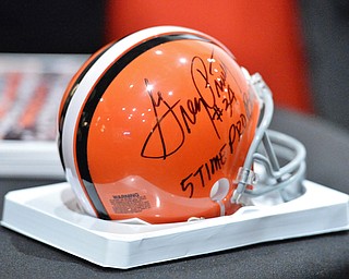 Jeff Lange | The Vindicator  APRIL 25, 2015 - A replica Browns helmet signed by Greg Pruitt, member of the 1980 Cleveland Browns.