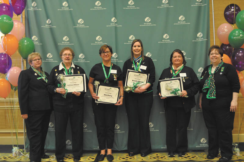SPECIAL TO THE VINDICATOR
As part of an April ceremony honoring adult volunteers, Girl Scouts of North East Ohio awarded Thanks Badges to, from left, Jane Christyson, Kathleen Milleson of Warren, Kim Perry, Wendy Gibson of Vienna, Linda West-McBride and Brenda Horton.