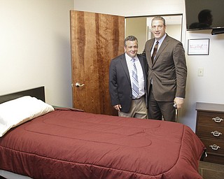        ROBERT K. YOSAY  | THE VINDICATOR..Rep Tim Ryan and with Tom Dailey in one of the rooms.. which holds two residents..First Step Recovery -Trumbull CountyÕs only detox center  opened  U.S. Rep. Tim Ryan and a host of  elected officials.   A tour will take place and ribbon cutting...THe Brick building on East Market in Warren. - First Step Recovery
