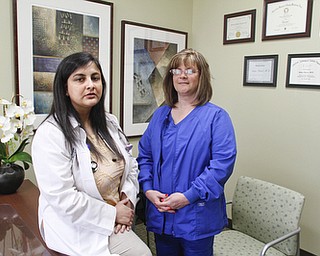       ROBERT K. YOSAY  | THE VINDICATOR..Dr. Sumira Adhikari Koirala, a Nepalese-American family physician  and Lisa Burbick - at St Elizabeths are heading up help for Nepal