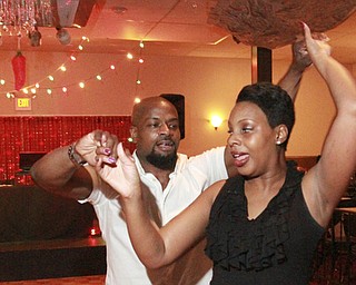 William d Lewis the Vindicator Kevin ellerbe and Denise Marcella during salsa dancing at Kuzman's in girard 5-3-15.