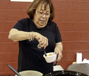 William d Lewis the Vindicator Phyllis Friedman of El Emeth Sisterhood in Liberty prepares Matzoh Balls during Taste of Faith event at St Charles Church in Boardman 5-4-15.