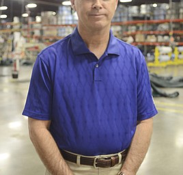 Katie Rickman | The Vindicator.Gary Crandall, owner of GLI Pool Products in Youngstown poses for a photo in the shop on May 5, 2015.