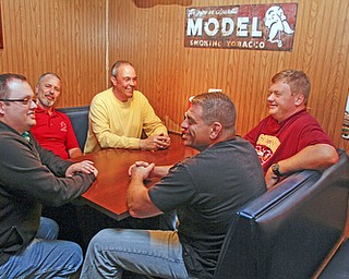        ROBERT K. YOSAY  | THE VINDICATOR..South Range anti levy - plan their  next move as the levy was soundly defeated - ..Clock wise from guy on left with glasses then clockwise..Jim Shaw - AFP - Greg Sorley -  Jeff Curry Rich Ferenchak and Joe Alessi..