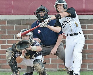 Jeff Lange | The Vindicator  MAY 6, 2015 - Crestview's Tyler Fitzsimmons (3) connects with a pitch for a foul ball in the first inning of Wednesday night's game at South Range.