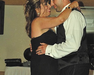 AND THE WINNER IS ... Meet Gary DiLisio of Youngstown. He submitted this picture of him dancing with his mother, Nancy DiLisio, also of Youngstown, for this year’s Mother’s Day Contest titled “Mama Told Me Not Come.” As it turned out, it was drawn as the winning entry. Sounds pretty routine, doesn’t it? 
Well, it’s actually cool that a guy is this year’s winner. You see, this is the first time the contest was open to sons to participate. Come June, the same will be offered to daughters for our Father’s Day Contest. 
For the past six years we’ve stuck to a more traditional gender match-up of daughters honoring their mothers and sons saluting their dads. We’re glad we changed it. Gary is, too. He won a $100 gift certificate to treat his mom to dinner at Bruno’s.
Here’s his entry: “I remember being 14 years old and wanting to participate in a backyard wrestling league with my friends because we thought it would be so cool to pretend we were just like the wrestlers on television. My mom said absolutely not, but I went against her better judgment. Sure enough, one of my buddies ended up power bombing me so hard into the wrestling mat that it took me nearly an hour to get back up! Seventeen years later, I now see a chiropractor regularly. Although it could be attributed to other things, I can’t help but wonder if it all goes back to the day that I should have listened to Mom.” 