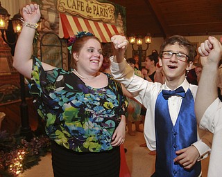 William D. Lewis The Vindicator Dancing at special needs prom 5-8-15 are special needs prom guests Mikayla Meardith and Joey Alberini Jr., both of Lakeview. Prom was held at St. Mary's in Youngstown.
