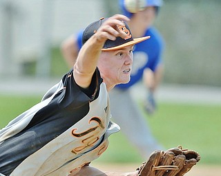 Jeff Lange | The Vindicator  MAY 9, 2015 - With a runner on first, Springfield starting pitcher Dalton Donachie delivers a pitch to a Poland batter in the bottom of the third inning of the Tigers' game at Poland High School.