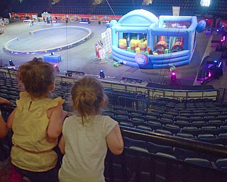 Katie Rickman | The Vindicator. Three-year-old twins Haven (left) and Sophia excitedly look out at the stage where the pre-show of the Ringling Bros. and Barnum & Bailey circus took place at Covelli Centre on May 6, 2015.
