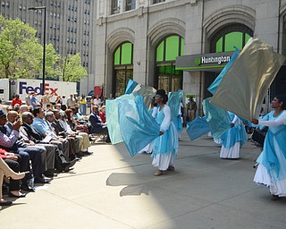 Katie Rickman | The Vindicator.Brides of Christ, a dance group of women from several Youngstown churches dance to a song during the National Day of Prayer ceremony downtown Youngstown on May 7, 2015.