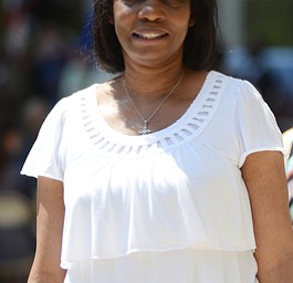 *** Didn’t know if we needed a mug of this woman, she was one of the contacts I was given for the event***..Katie Rickman | The Vindicator.Linda Daniels poses for a photo during the National Day of Prayer ceremony downtown Youngstown on May 7, 2015.