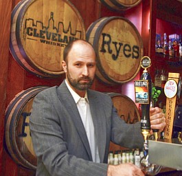 Katie Rickman | The Vindicator.Jeff Kurz, owner of Ryes Craft Beer & Whiskey pours a draft beer at his Youngstown business on May 7, 2015.