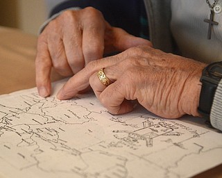 Katie Rickman | The Vindicator.Vince Bellanca of Youngstown was in the 44th Infantry Division in WW2, he points to various locations that he was stationed abroad. Bellanca discusses his reaction on VE Day.