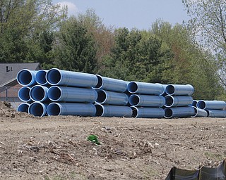        ROBERT K. YOSAY  | THE VINDICATOR..Replacing the water line (24 inch) is Kirila Construction along Rt11 in Canfield as work goes on to the west of the road..