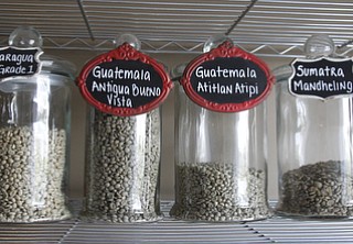        ROBERT K. YOSAY  | THE VINDICATOR..Freshly roasted beans sit for at least 24 hours after roasting..StoneFruit - Canfield coffee shop t Joshua and Jennifer,(Jennifer Rodway, 25, of Liberty, co-owns the business with her husband, Josh Langenheim, 30, also of Liberty.) married couple, who have imported Roasting machines from heavy coffee countries Morrocco and Turkey. They will also have a coffee shop within the Canfield Public Library once it is open..