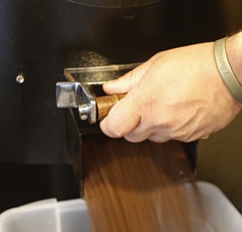        ROBERT K. YOSAY  | THE VINDICATOR..After roasting the beans empty into containers for  at least 24 hours before they can be ground for coffee..StoneFruit - Canfield coffee shop t Joshua and Jennifer,(Jennifer Rodway, 25, of Liberty, co-owns the business with her husband, Josh Langenheim, 30, also of Liberty.) married couple, who have imported Roasting machines from heavy coffee countries Morrocco and Turkey. They will also have a coffee shop within the Canfield Public Library once it is open..