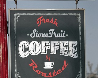        ROBERT K. YOSAY  | THE VINDICATOR..StoneFruit - Canfield coffee shop t Joshua and Jennifer,(Jennifer Rodway, 25, of Liberty, co-owns the business with her husband, Josh Langenheim, 30, also of Liberty.) married couple, who have imported Roasting machines from heavy coffee countries Morrocco and Turkey. They will also have a coffee shop within the Canfield Public Library once it is open..