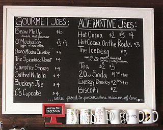        ROBERT K. YOSAY  | THE VINDICATOR..StoneFruit - Canfield coffee shop t Joshua and Jennifer,(Jennifer Rodway, 25, of Liberty, co-owns the business with her husband, Josh Langenheim, 30, also of Liberty.) married couple, who have imported Roasting machines from heavy coffee countries Morrocco and Turkey. They will also have a coffee shop within the Canfield Public Library once it is open..