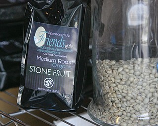        ROBERT K. YOSAY  | THE VINDICATOR..Local brands are being added .....StoneFruit - Canfield coffee shop t Joshua and Jennifer,(Jennifer Rodway, 25, of Liberty, co-owns the business with her husband, Josh Langenheim, 30, also of Liberty.) married couple, who have imported Roasting machines from heavy coffee countries Morrocco and Turkey. They will also have a coffee shop within the Canfield Public Library once it is open..
