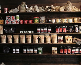        ROBERT K. YOSAY  | THE VINDICATOR..A variety of local flavors  sold in the coffee shop on Main.  .StoneFruit - Canfield coffee shop t Joshua and Jennifer,(Jennifer Rodway, 25, of Liberty, co-owns the business with her husband, Josh Langenheim, 30, also of Liberty.) married couple, who have imported Roasting machines from heavy coffee countries Morrocco and Turkey. They will also have a coffee shop within the Canfield Public Library once it is open..