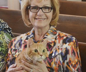 Katie Rickman | The Vindicator.Kinda Ruggles of Boardman holds her cat Tucker during the annual Animal Blessing at St. James the Episcopal Church in Boardman on Sunday May 10, 2015.
