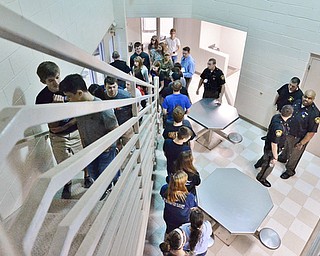 Jeff Lange | The Vindicator  MAY 7, 2015 - Jackson Milton seniors tour the living space of the juvenile portion of the Mahoning County Jail, Thursday morning as part of the class' prom promise.