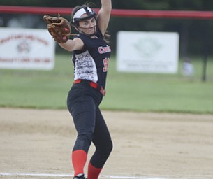 Katie Rickman | The Vindicator.Canfield's Bridget Durkin (18) pitches during the second inning against Girard at Canfield High School on May 12, 2015.