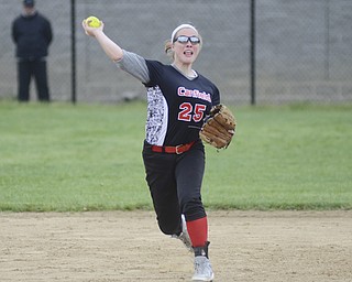 Katie Rickman | The Vindicator.Canfield's short stop Rachel Tinkey (25) throws in the ball after catching the out during the 5th against Girard at Canfield High School on May 12, 2015.