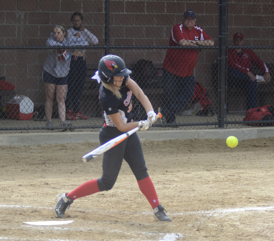 Katie Rickman | The Vindicator.Canfield's Kara Rothbauer (32) bats during the third inning against Girard at Canfield High School on May 12, 2015.