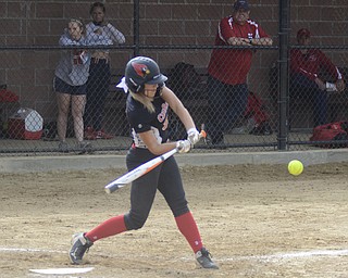Katie Rickman | The Vindicator.Canfield's Kara Rothbauer (32) bats during the third inning against Girard at Canfield High School on May 12, 2015.