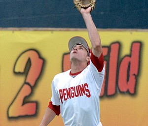 Jeff Lange | The Vindicator  MAY 12, 2015 - Penguins' right field Lorenzo Arcuri catches a fly sent to far right field for the second out of the second inning against The Ohio State University, Tuesday night at Eastwood Field.