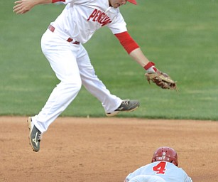 Jeff Lange | The Vindicator  MAY 12, 2015 - OSU's Ronnie Dawson (4) dives safely into second as Youngstown's shortstop Shane Willoughby hops to catch the throw from home in the third inning of their game, Tuesday night at Eastwood Field.