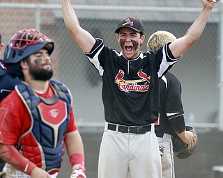 William D Lewis the vindicator Canfield's David shaffer reacts after Mike Sebes scored winning running in game with niles thursday 5-14 at Canfield. at left is Niles catcher Cameron Carson (7).