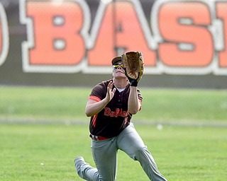 NEW MIDDLETOWN, OHIO - MAY 15, 2015: Right fielder Alex Guy #3 of East Palestine dives to catch the ball for the out int he bottom of the 4th inning during a game Friday afternoon at Springfield High School. (Photo by David Dermer/Youngstown Vindicator)