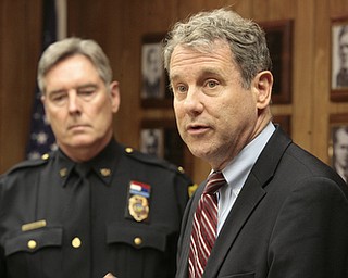        ROBERT K. YOSAY  | THE VINDICATOR..U.S. Sen. Sherrod Brown, a Democrat of Cleveland, met with local law enforcement today to discuss the importance of federal funds to maintain safety..The Byrne Justice Assistance Grant (Byrne JAG) program has provided more than $15 million to help Ohio police departments.-those in attendance - Brown at mike- YPD chief Robin Lees-