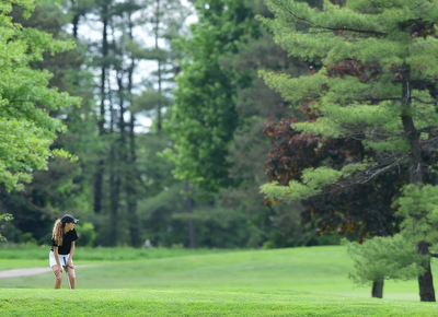 VIENNA, OHIO - MAY 17, 2015: Britney Jonda of Boardman reacts after missing at putt on the 3rd hole Sunday afternoon at Squaw Creek Country Club during the Vindy Greatest Golfer junior qualifier. (Photo by David Dermer/Youngstown Vindicator)