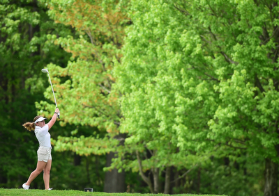 VIENNA, OHIO - MAY 17, 2015: Olivia Taylor of Girard follows through on her tee shot on the 4th hole Sunday afternoon at Squaw Creek Country Club during the Vindy Greatest Golfer junior qualifier. (Photo by David Dermer/Youngstown Vindicator)