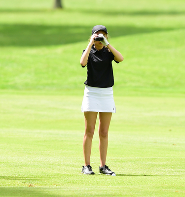 VIENNA, OHIO - MAY 17, 2015: Britney Jonda of Boardman uses her range finder on the 4th hole Sunday afternoon at Squaw Creek Country Club during the Vindy Greatest Golfer junior qualifier. (Photo by David Dermer/Youngstown Vindicator)
