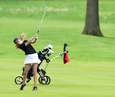 VIENNA, OHIO - MAY 17, 2015: Britney Jonda of Boardman follows through on her swing as she chips from he fairway toward the green on the 4th hole Sunday afternoon at Squaw Creek Country Club during the Vindy Greatest Golfer junior qualifier. (Photo by David Dermer/Youngstown Vindicator)