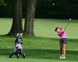 VIENNA, OHIO - MAY 17, 2015: Taylor Vassis of Vienna follows through on her approach shot on the 13th hole Sunday afternoon at Squaw Creek Country Club during the Vindy Greatest Golfer junior qualifier. (Photo by David Dermer/Youngstown Vindicator)
