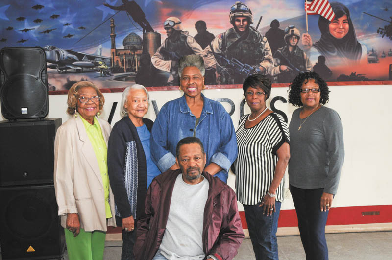 SPECIAL TO THE VINDICATOR
VFW Post 6488, 2065 Coitsville-Hubbard Road, Youngstown, and its Ladies Auxiliary will host its annual Memorial Day observance at 1 p.m. Monday. The Rev. Kenneth L. Simon, pastor of New Bethel Baptist Church, will be the keynote speaker. The ceremony will include a tribute to Arlette T. Gatewood of Local Union 1462 Steel Workers of America AFL-CIO-CIC., dedicated trade unionist. Special recognition will be given to the widows of departed comrades. Above, seated, is Glenn Barnett, post trustee, and standing, from left are Katherine Williams, Joyce Paul, Geraldine Crenshaw, Sandy Graves, auxiliary president; and Valerie Beal, co-chairman. 
