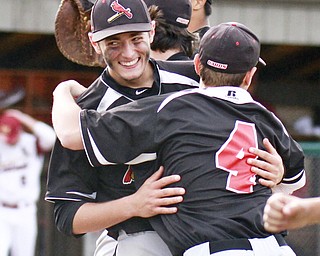 William D. Lewis the Vindicator Canfield's Joey Machuga(1) winning pitcher celebrates with Mike Pappas(4) after5/20/15 win over Mooney at Cene.