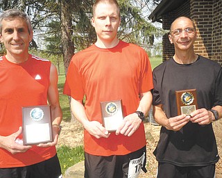 SPECIAL TO THE VINDICATOR
Austintown Lions Club sponsored its 20th annual 5K run May 9 at Austintown Township Park. Lion Larry Jensen has served as director for every race. Participating in the event were 90 runners. Above left, overall winners were Tom Grantonic of Boardman, first place; Ed Brainard of Canfield, second; and Larry Bovo of Struthers, third. Women’s overall winners, below top, were Alyssa Lynch of Austintown, first place; Alyssa Wirtz of Canfield, second; and Shannon Dudash of Poland, third. A kids run also took place, and Kylie Morgan, 7, of Alliance, below middle, took the winning spot. The Youngstown Road Runners Club provided the finish line. The top-three finishers in the ladies masters race are at the bottom. Finishing first was Renay Choma, second place went to Renee Boden, and third went to Susan Sarachene. 